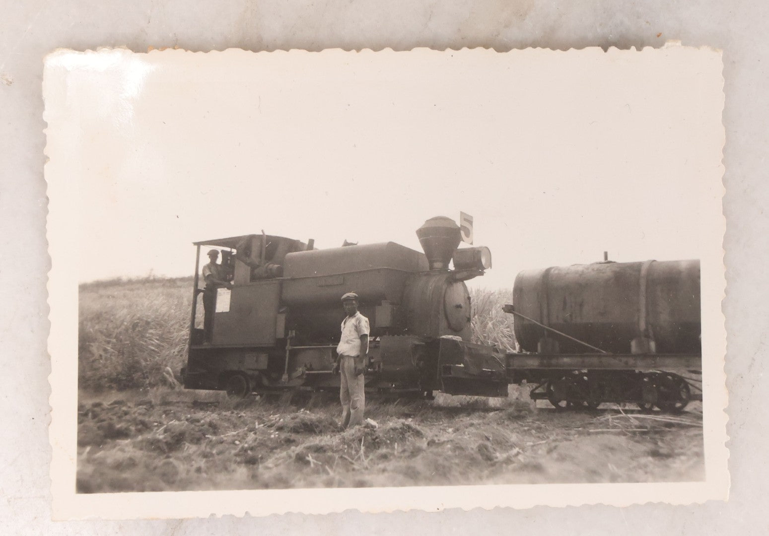 Lot 103 - Grouping Of Five Interesting Vintage Snapshot Photographs Including Middle Eastern Scenes, A Train Locomotive, And The Home Of Dr. Bruce Coloma