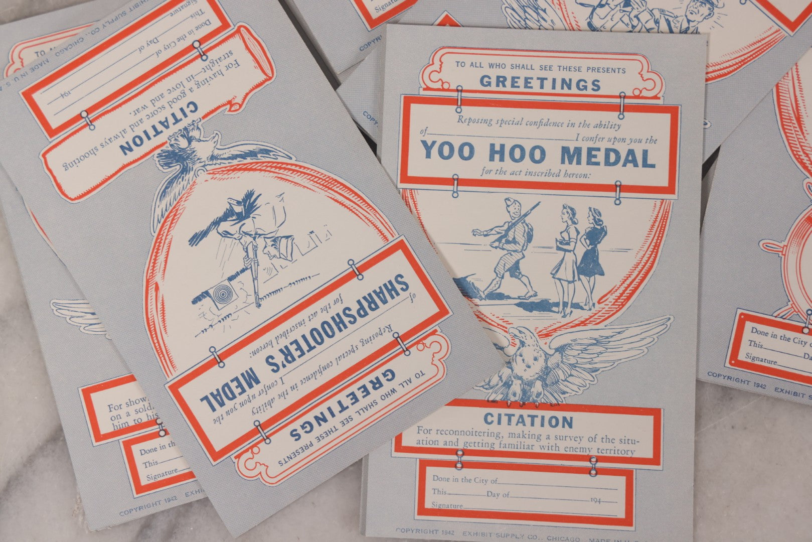 Lot 106 - Grouping Of 32 Vintage World War 2 Comic Military Citation And Medal Postcards, Copyright 1942, By Exhibit Supply Co., Chicago, Illinois