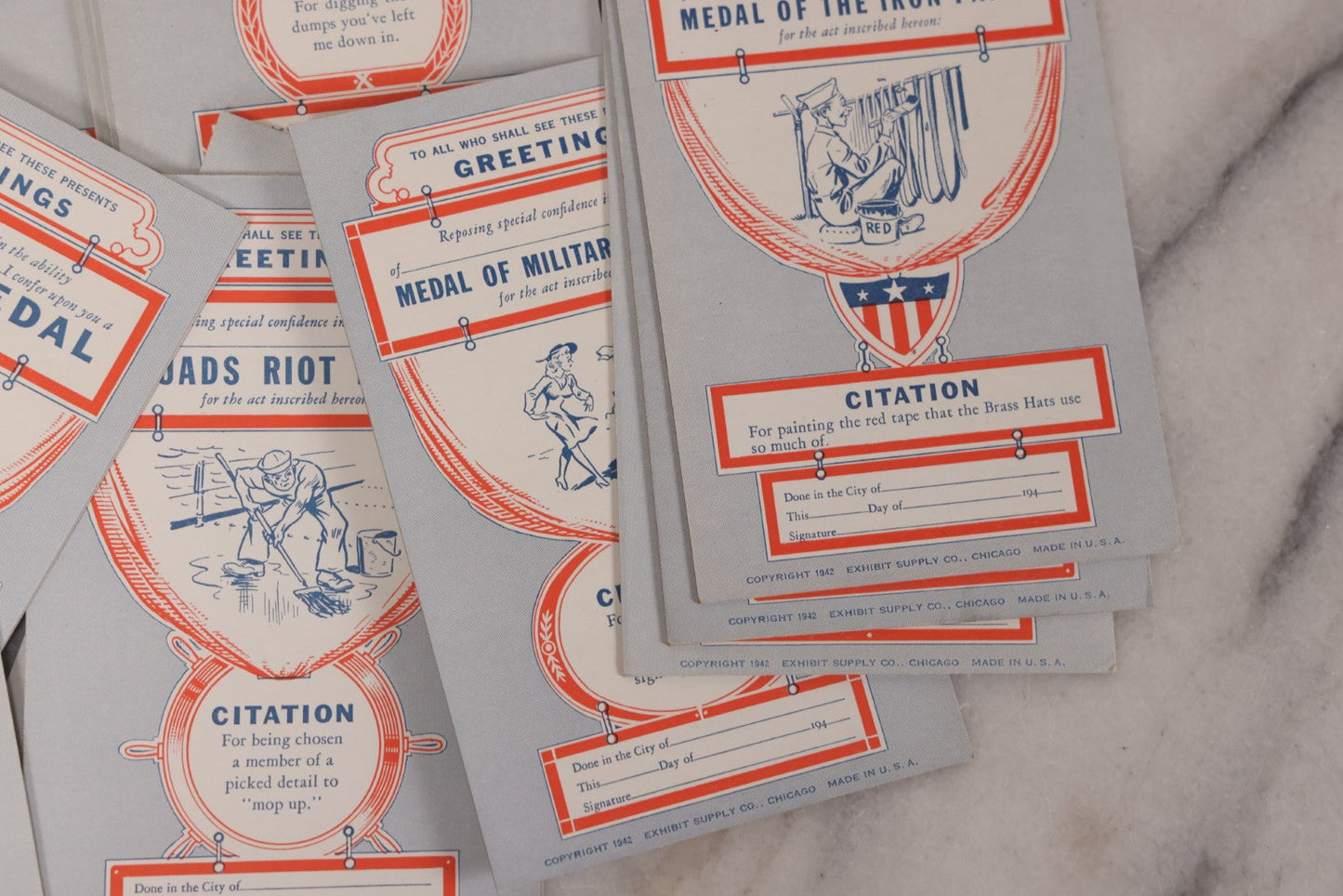 Lot 106 - Grouping Of 32 Vintage World War 2 Comic Military Citation And Medal Postcards, Copyright 1942, By Exhibit Supply Co., Chicago, Illinois