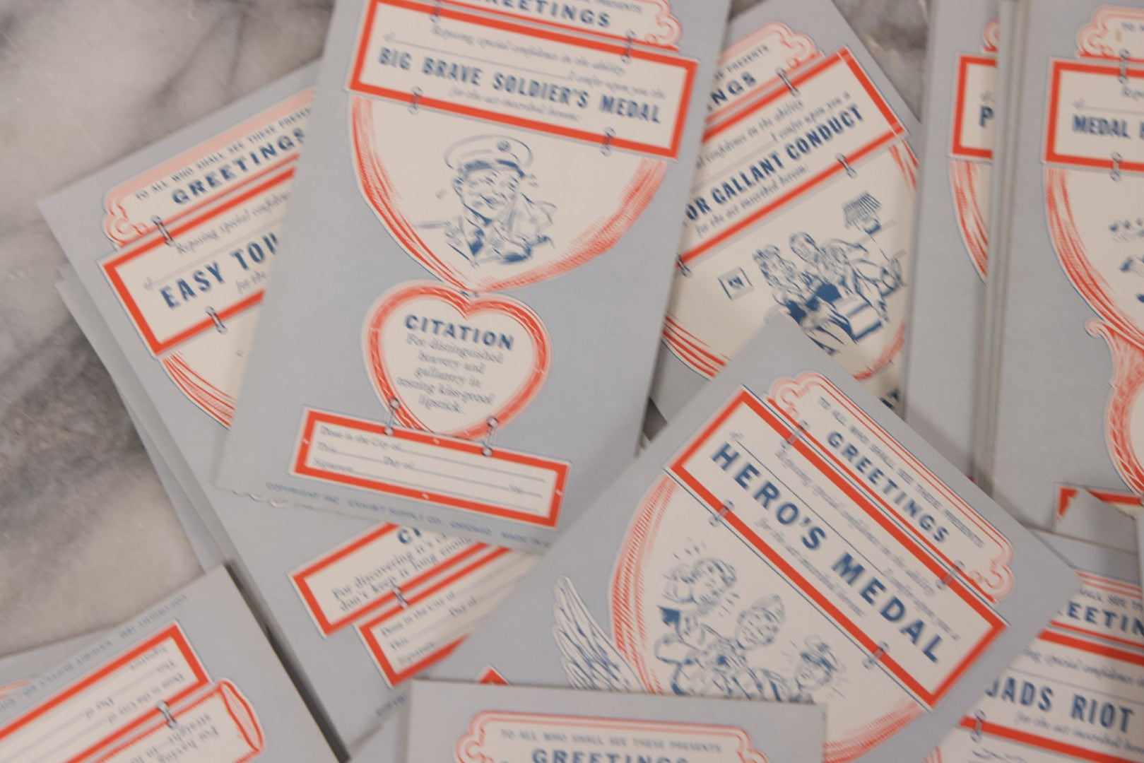 Lot 106 - Grouping Of 32 Vintage World War 2 Comic Military Citation And Medal Postcards, Copyright 1942, By Exhibit Supply Co., Chicago, Illinois
