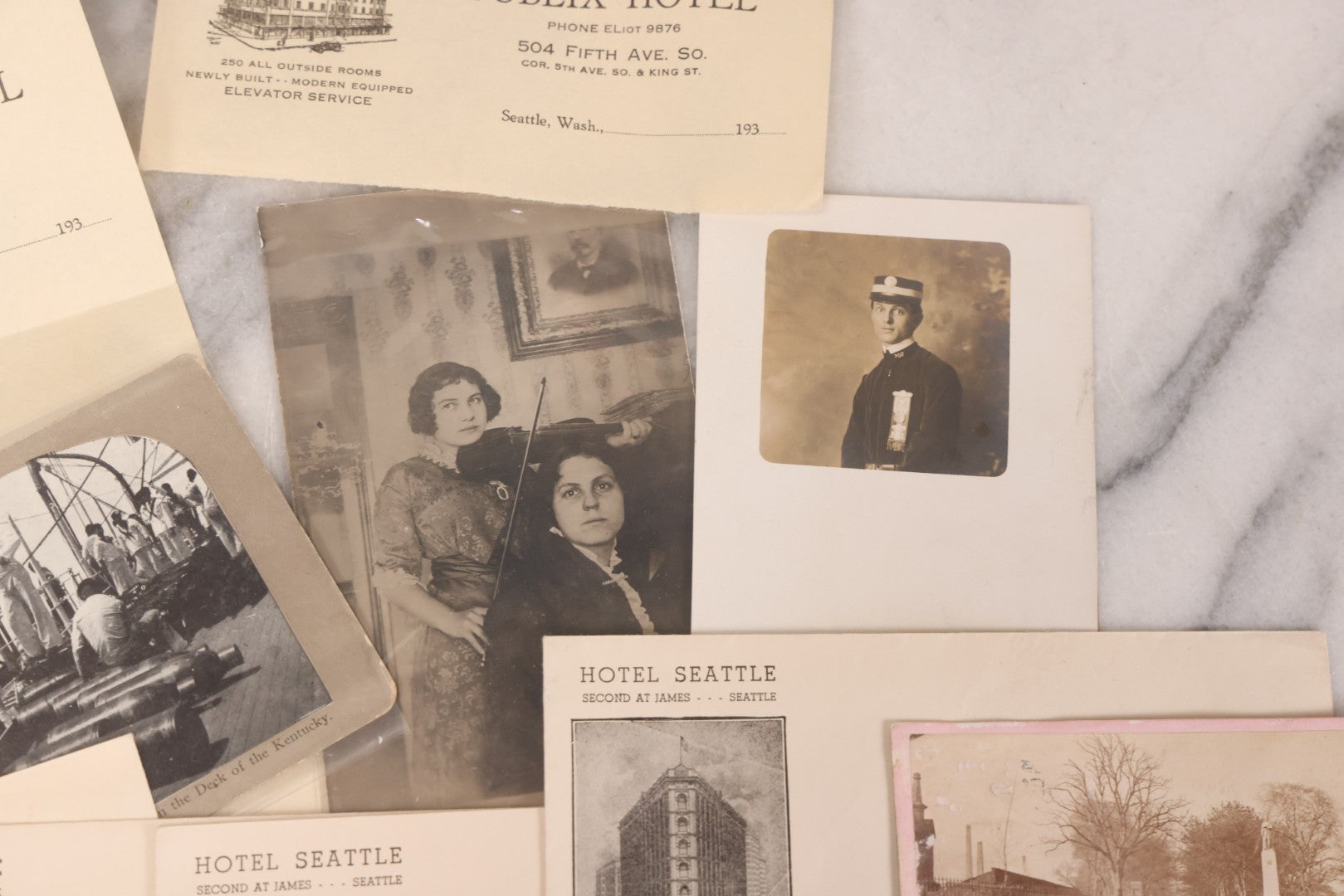 Lot 110 - Nine Piece Vintage And Antique Ephemera Grouping Including Real Photo Postcards R.P.P.C. Of Women With Violin, Man In Uniform, Landscape C.D.V. Photograph, Envelopes And Stationary From Seattle Hotels, And Stereoview Of The Deck Of Battleship