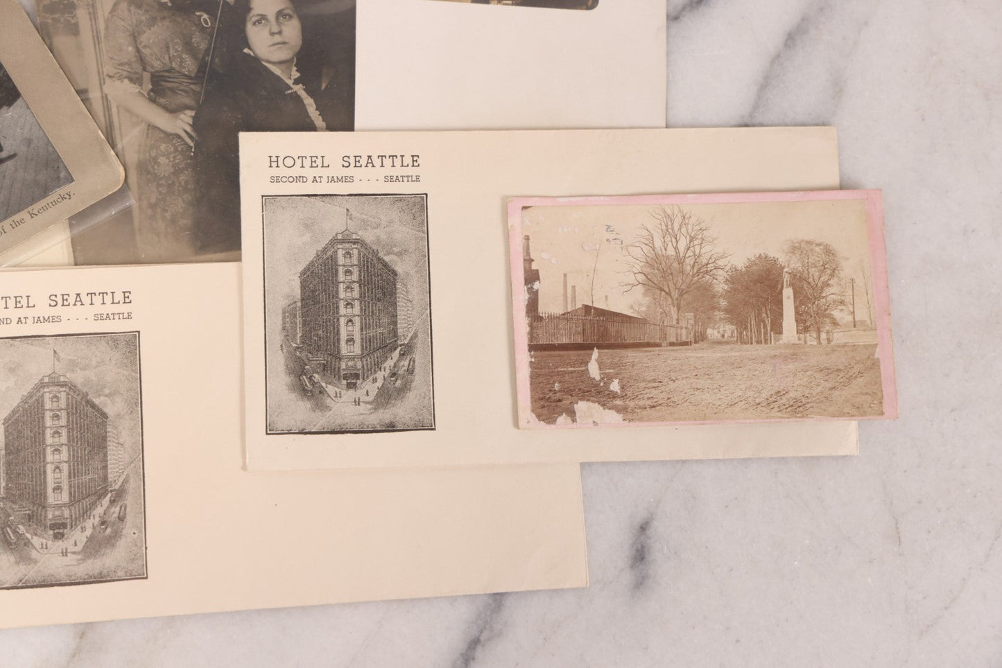 Lot 110 - Nine Piece Vintage And Antique Ephemera Grouping Including Real Photo Postcards R.P.P.C. Of Women With Violin, Man In Uniform, Landscape C.D.V. Photograph, Envelopes And Stationary From Seattle Hotels, And Stereoview Of The Deck Of Battleship