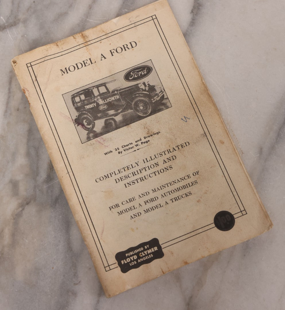 Lot 128 - Two Piece Vintage Automobile Grouping Including Ford Model A. Clymer Manual, Copyright 1928, And "Automobile Starting, Lighting, And Ignition Systems" Book By Victor W. Page, Copyright 1925