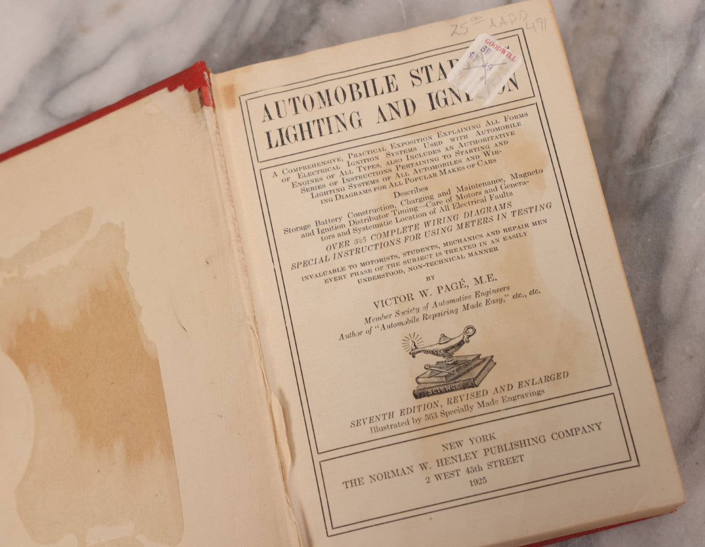 Lot 128 - Two Piece Vintage Automobile Grouping Including Ford Model A. Clymer Manual, Copyright 1928, And "Automobile Starting, Lighting, And Ignition Systems" Book By Victor W. Page, Copyright 1925