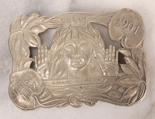Lot 069 - Vintage Reproduction Lillie Langtry, "The Jersey Lily," British Socialite And Actress, Metal Belt Buckle, Made After The Original 1901 Tiffany Design, 3-1/4" x 2-1/4"