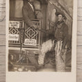 Lot 083 - Antique Real Photo Postcard R.P.P.C. Showing Young Man Dressed As Cowboy Shaking Hands With Older Man On Faux Train Photography Set In Denver, Colorado