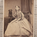 Lot 085 - Antique Carte De Visite C.D.V. Photograph Of Young Woman In Large Dress Posing With Scraggly Little Black Dog, John Moffat, Edinburgh, Scotland
