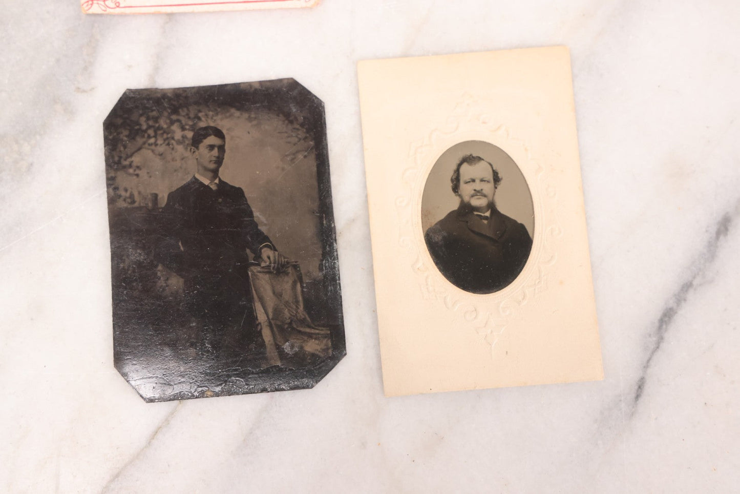 Lot 095 - Grouping Of Sixteen Antique Tintype Photographs Of Men Women And Children Including Two Children In Chairs, Brother And Sister, With Hand Tinting, Young Man Standing With Book, Family Portrait, And More
