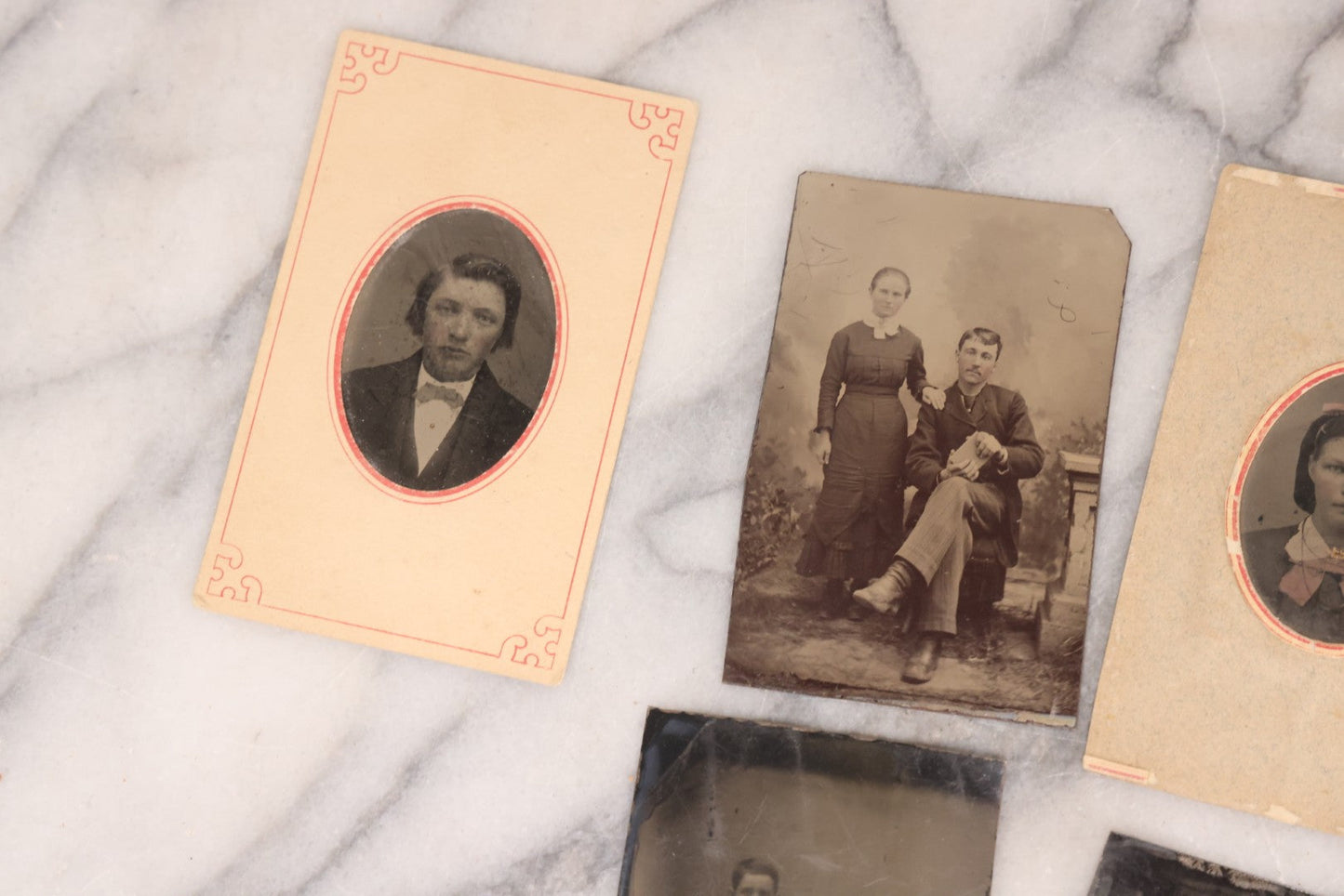 Lot 095 - Grouping Of Sixteen Antique Tintype Photographs Of Men Women And Children Including Two Children In Chairs, Brother And Sister, With Hand Tinting, Young Man Standing With Book, Family Portrait, And More