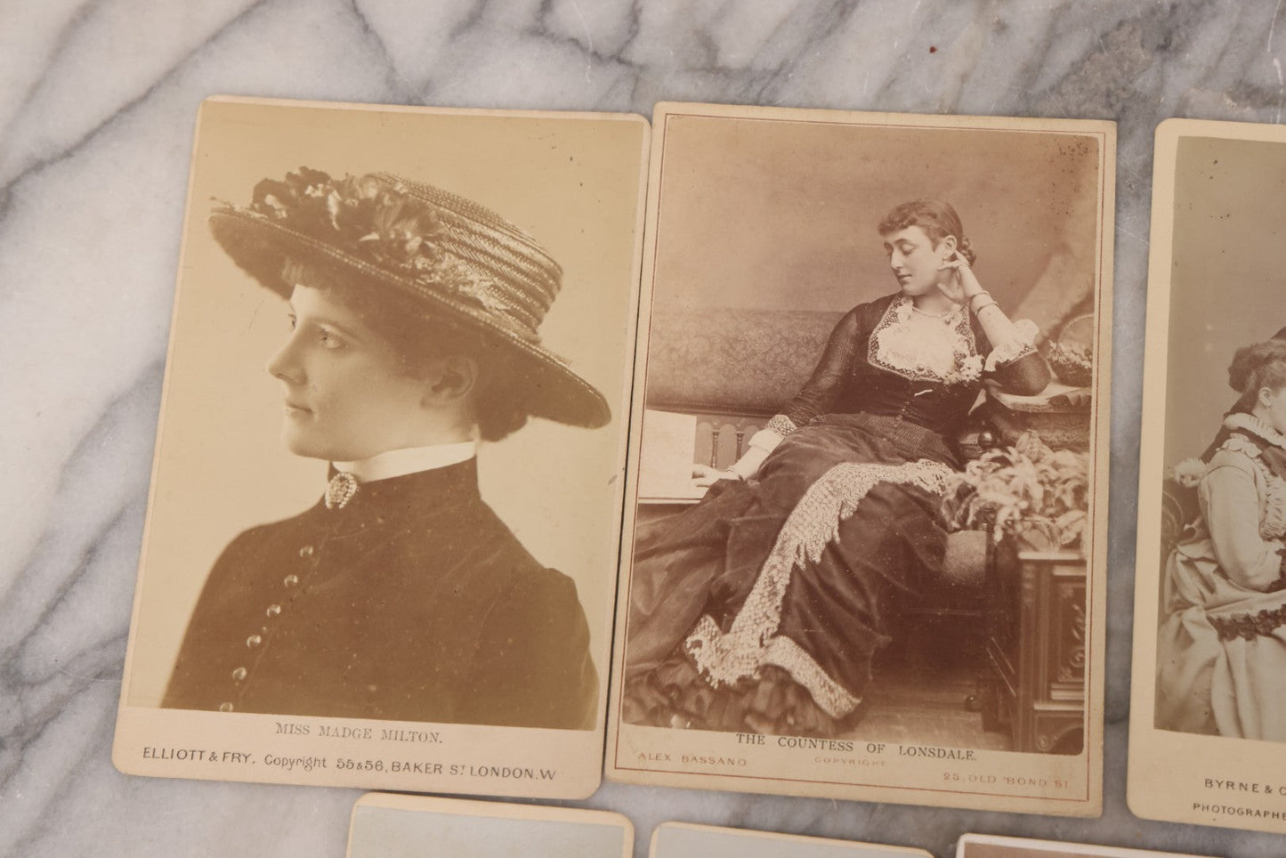 Lot 100 - Grouping Of Antique Photographs By British Photographers Including Four Cabinet Cards And Five Carte De Visite C.D.V. Photos By Photographers Including W. & D. Downey, Byrne & Co., Alexander Bassano, Elliott And Fry, And More