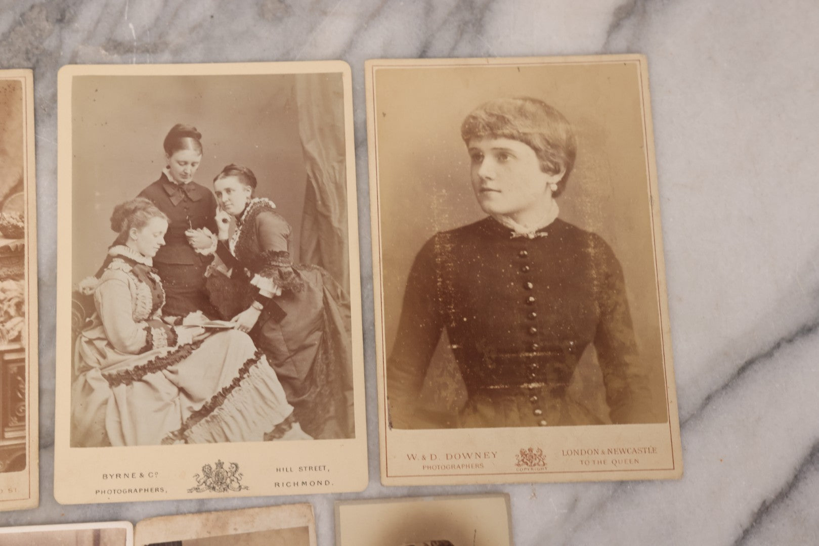 Lot 100 - Grouping Of Antique Photographs By British Photographers Including Four Cabinet Cards And Five Carte De Visite C.D.V. Photos By Photographers Including W. & D. Downey, Byrne & Co., Alexander Bassano, Elliott And Fry, And More