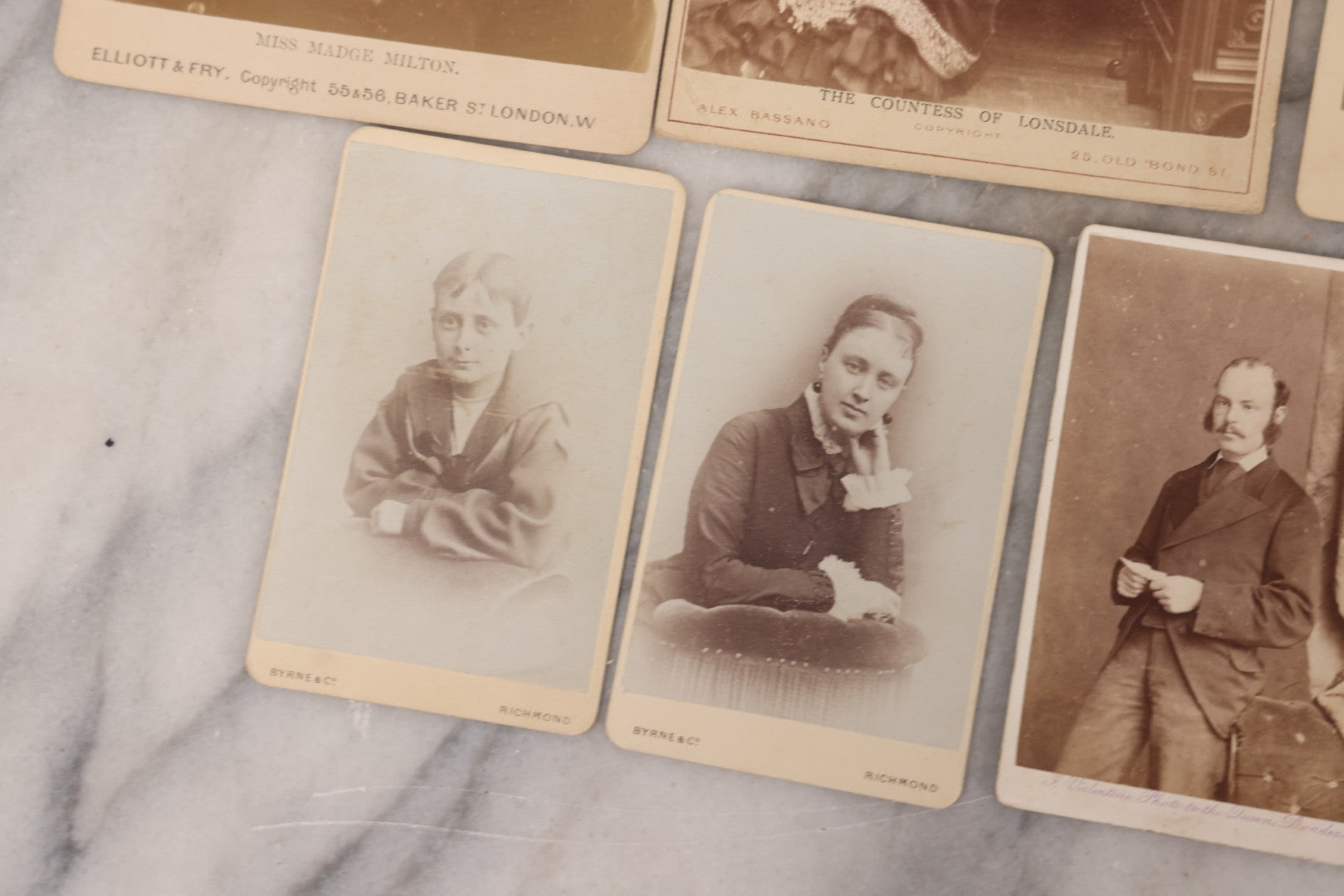 Lot 100 - Grouping Of Antique Photographs By British Photographers Including Four Cabinet Cards And Five Carte De Visite C.D.V. Photos By Photographers Including W. & D. Downey, Byrne & Co., Alexander Bassano, Elliott And Fry, And More