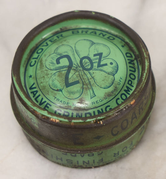 Lot 047 - Vintage Clover Brand Valve Grinding Compound Lithographed 2 Ounce Tin With Four Leaf Clover Motif On Lid, Made In U.S.A. By Clover Manufacturing Co., Norwalk, Connecticut, 1-3/8" Height