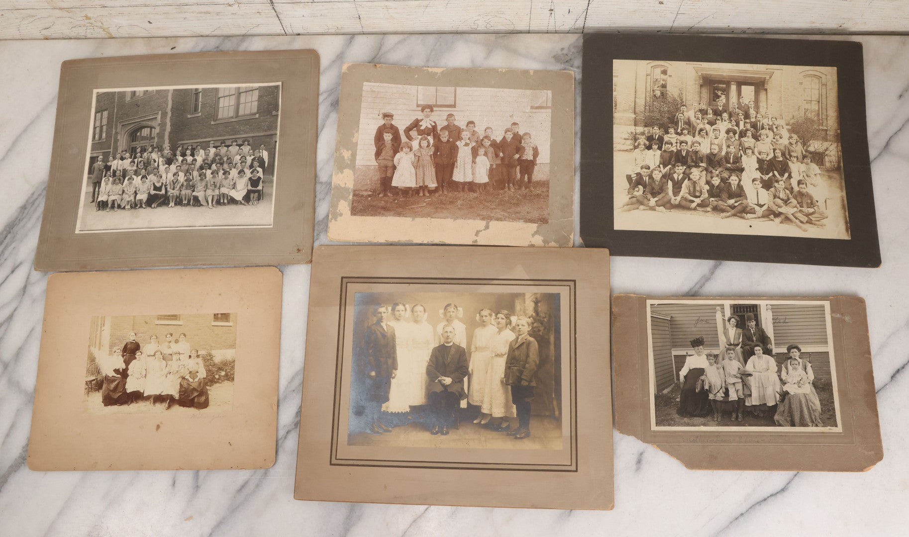 Lot 067 - Grouping Of Six Antique Boarded Photographs Of Schoolchildren Including Group Of First Communion Recipients Posing With Priest, Group Posing With Principal, And More