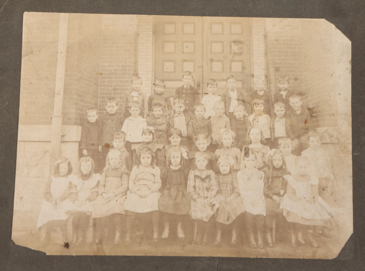 Lot 071 - Grouping Of Four Antique Boarded Photographs Of Class Photos Of Schoolchildren, Including Children Posing With Chicken In Background, Children Posing On School Steps, And Children Posing Beneath Fire Escape
