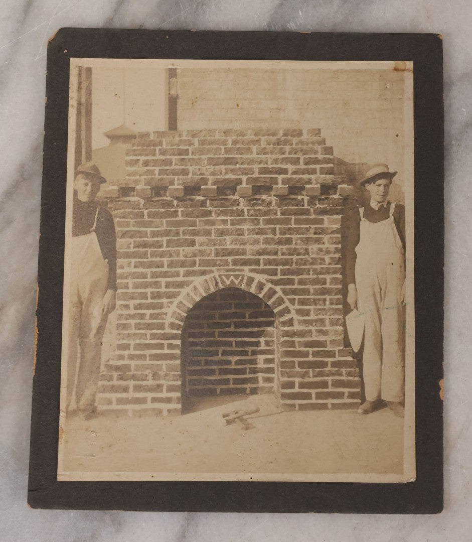 Lot 091 - Antique Boarded Photograph Of Two Young Bricklayers Posing W ...