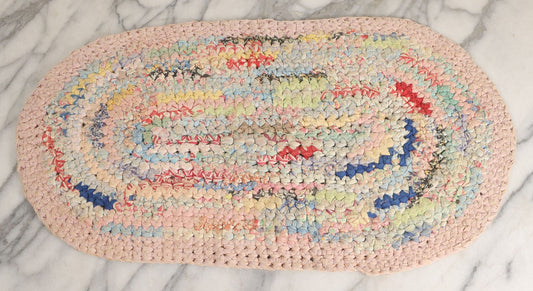 Lot 032 - Vintage Handmade Hooked Oval Rug With Many Bright Colors Including Pink, Red, Green, And Blue, 23" x 12-3/4"