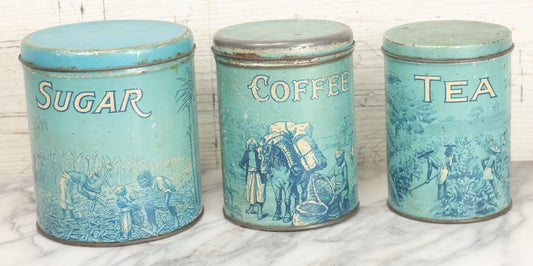 Lot 040 - Three Piece Vintage Tin Lithograph Graduated Nesting Kitchen Canister Set Including Tea, Coffee, And Sugar With Blue Color And Scenes Of Agricultural Workers