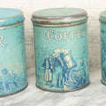 Lot 040 - Three Piece Vintage Tin Lithograph Graduated Nesting Kitchen Canister Set Including Tea, Coffee, And Sugar With Blue Color And Scenes Of Agricultural Workers