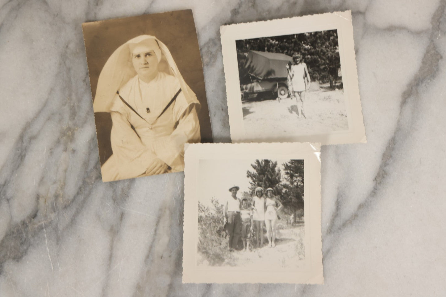 Lot 087 - Grouping Of 35 Vintage Vernacular Black And White Photographs, Including Nun, Soldiers, Women At The Beach, Boston Terrier Dog In Car, And Parade Photos