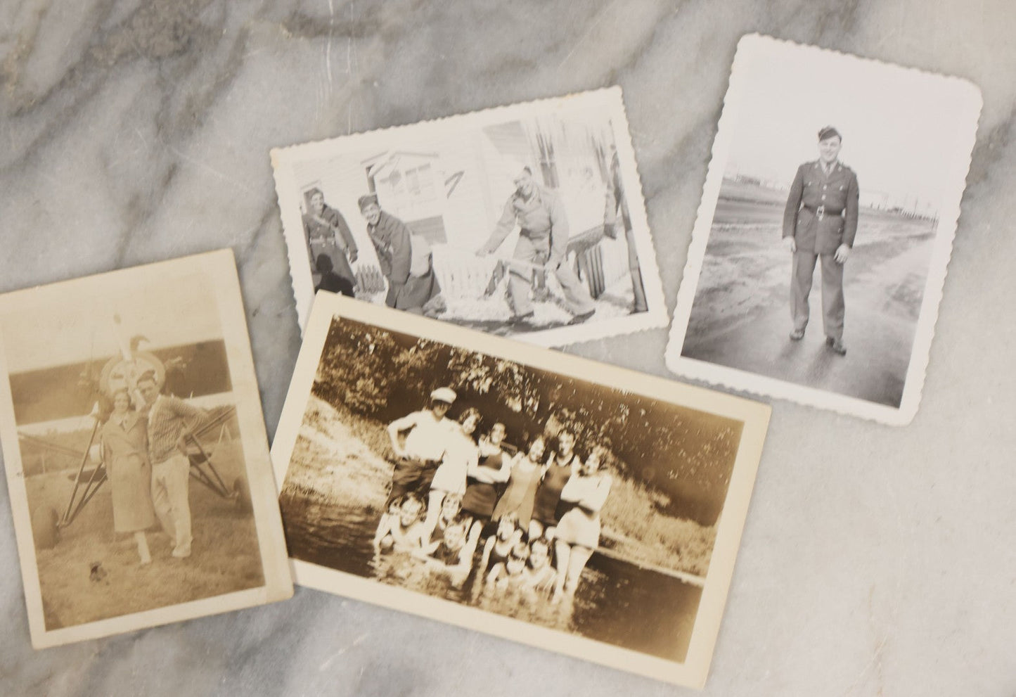 Lot 087 - Grouping Of 35 Vintage Vernacular Black And White Photographs, Including Nun, Soldiers, Women At The Beach, Boston Terrier Dog In Car, And Parade Photos