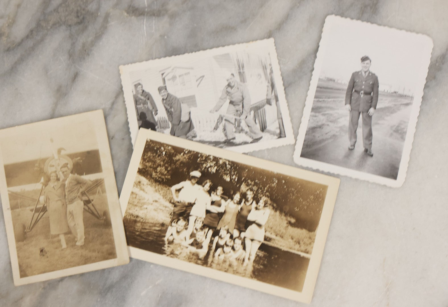 Lot 087 - Grouping Of 35 Vintage Vernacular Black And White Photographs, Including Nun, Soldiers, Women At The Beach, Boston Terrier Dog In Car, And Parade Photos