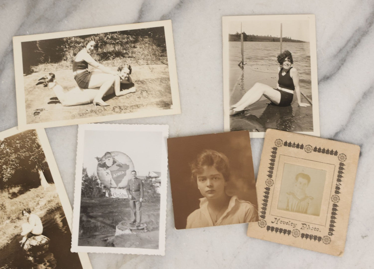 Lot 087 - Grouping Of 35 Vintage Vernacular Black And White Photographs, Including Nun, Soldiers, Women At The Beach, Boston Terrier Dog In Car, And Parade Photos