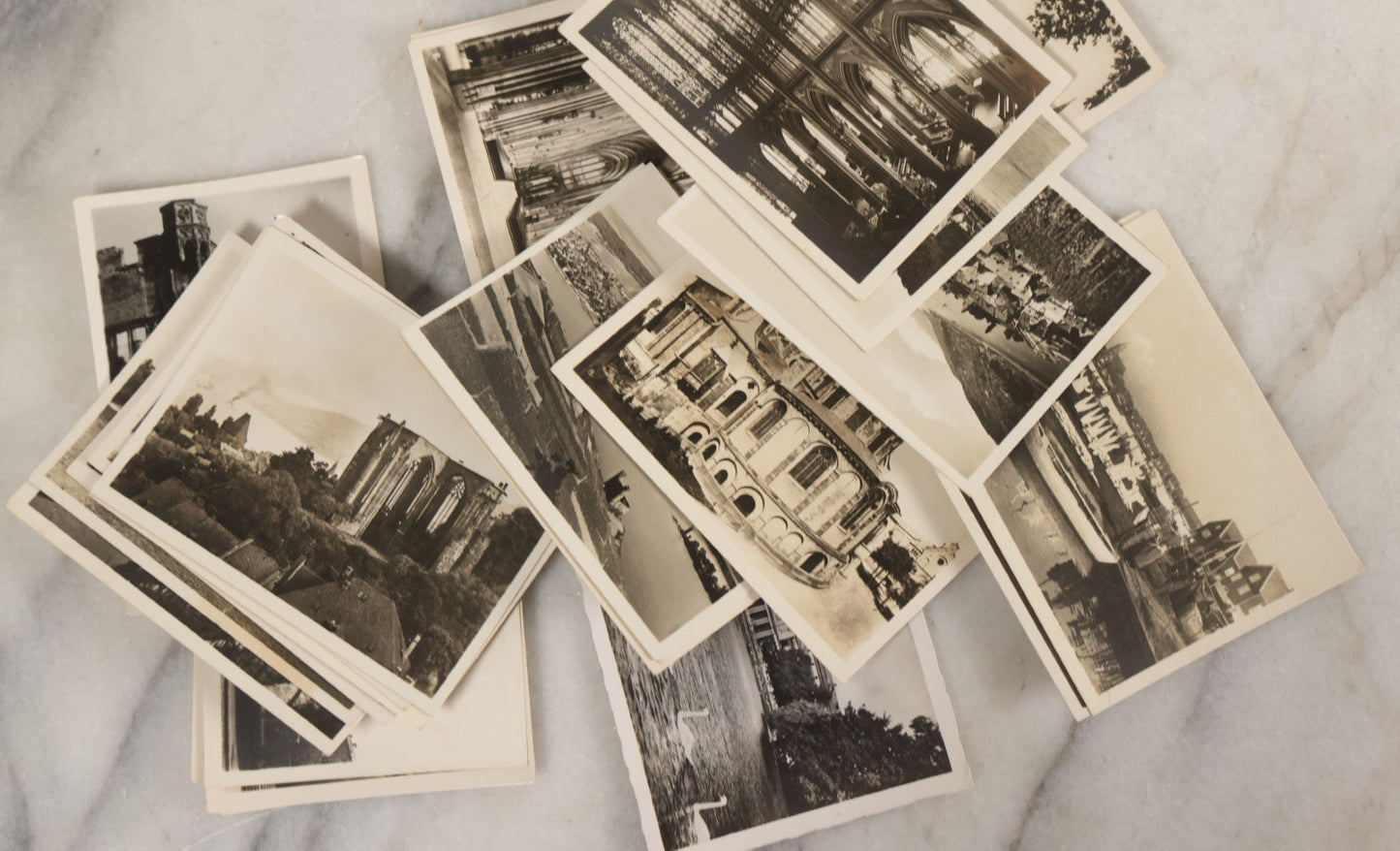 Lot 089 - Grouping Of 32 Souvenir Black And White Photographs From Europe, Including Cathedrals, Bridges, Architecture And More