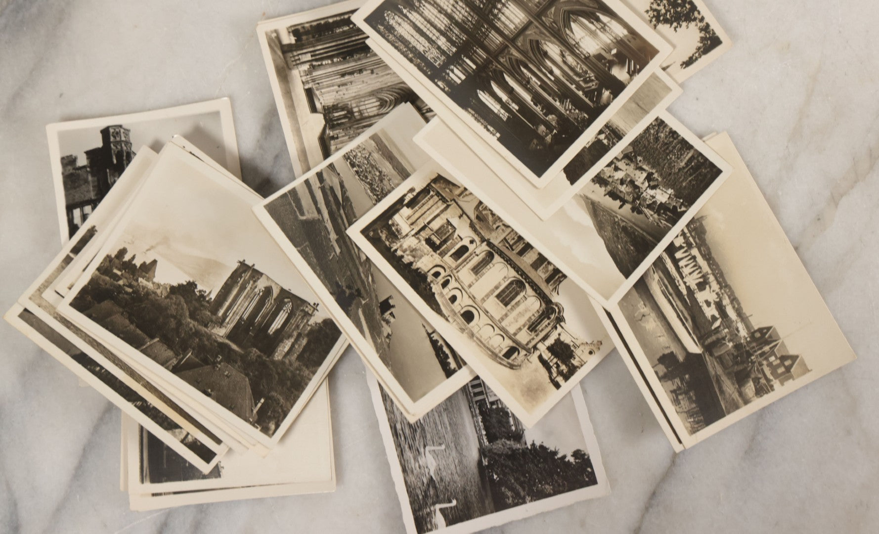 Lot 089 - Grouping Of 32 Souvenir Black And White Photographs From Europe, Including Cathedrals, Bridges, Architecture And More