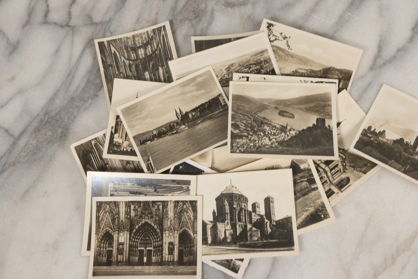 Lot 089 - Grouping Of 32 Souvenir Black And White Photographs From Europe, Including Cathedrals, Bridges, Architecture And More
