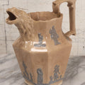 Lot 058 - Antique White Ironstone Pitcher With Figural Lion Head Spout, Blue Molded Neoclassical Figures, Note Damaged With Old Repairs, 9-3/4" Height