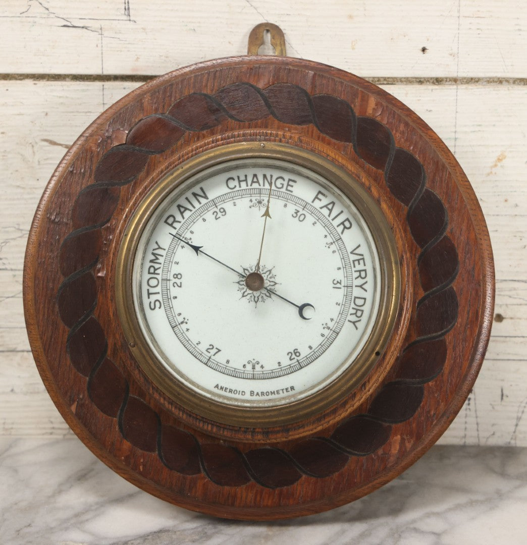Lot 022 - Vintage Aneroid Barometer On Wood Plaque With Twisted Rope Inlay Motif, Beveled Glass Brass Surround, Wall Hanger, 9-3/4" Diameter