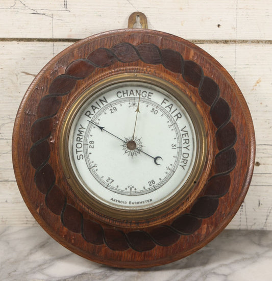 Lot 022 - Vintage Aneroid Barometer On Wood Plaque With Twisted Rope Inlay Motif, Beveled Glass Brass Surround, Wall Hanger, 9-3/4" Diameter