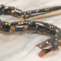 Lot 038 - Vintage Filipino Tourist Collectible Export Jointed Snake Toy With Painted Details Paper Label, By C.N.I., Philippines 21-3/4" Length
