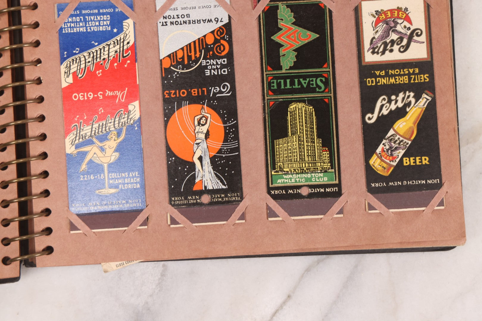 Lot 009 - Vintage Matchbook Cover Collection In "Twin Slit" Album With 100+ Match Book Covers Including Cocoanut Grove Nightclub, Location Of Deadly Fire In Boston, Red Devil Restaurant, New York, Many Others Clubs And Restaurants, Pinups, And More