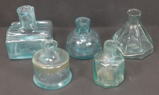 Lot 061 - Grouping Of Five Antique Glass Inkwell Bottles Including W.E. Bonney, Others, Note Chips