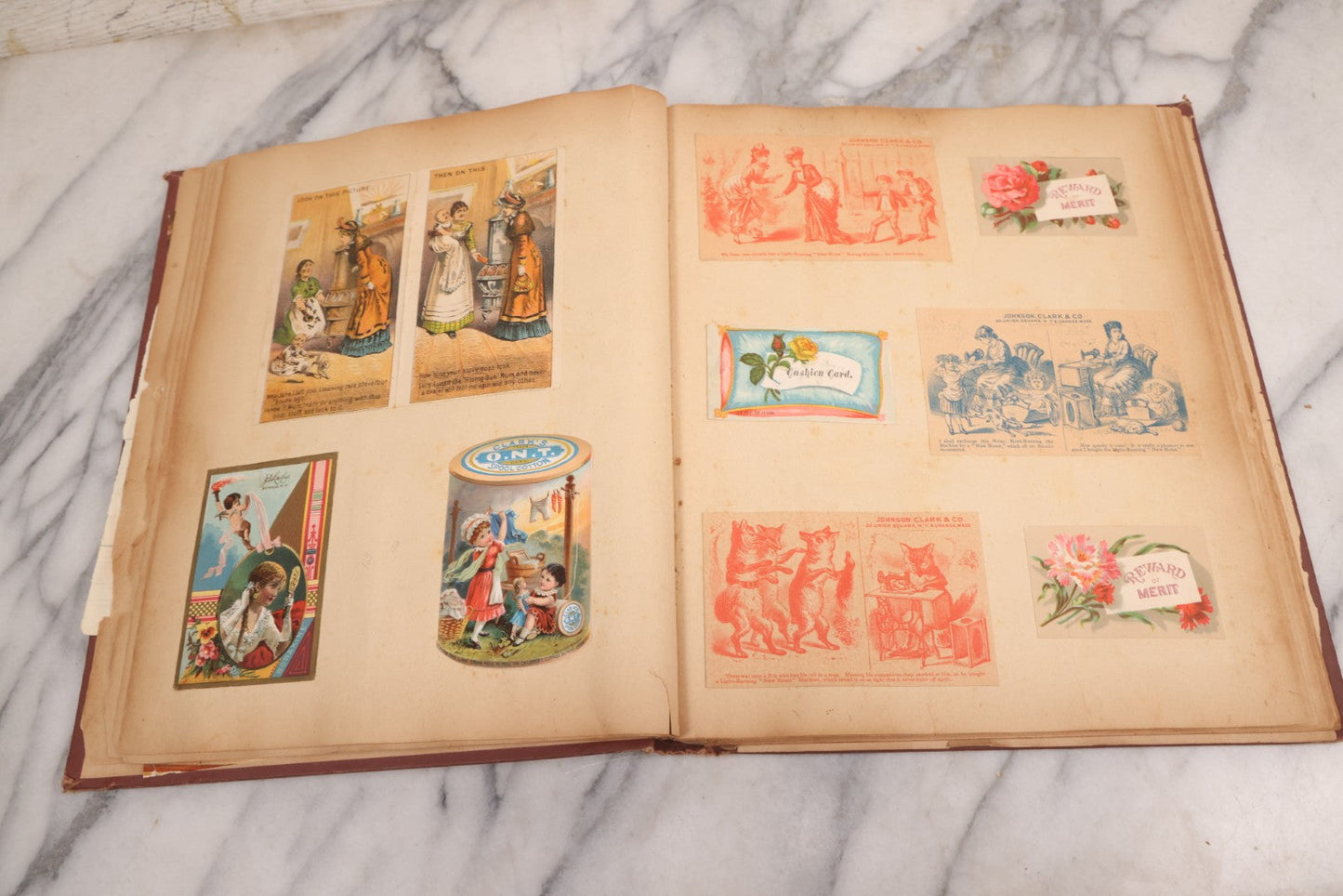 Lot 114 - Antique Victorian Scrapbook Album With Textured Urns On Cover Containing 70+ Pieces Including Trade Cards, Die Cuts, Calling Cards, And Other Scraps