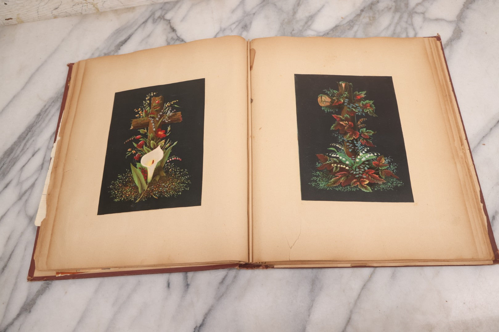 Lot 114 - Antique Victorian Scrapbook Album With Textured Urns On Cover Containing 70+ Pieces Including Trade Cards, Die Cuts, Calling Cards, And Other Scraps
