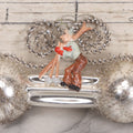 Lot 155 - Vintage Tinsel And Tin And Wire Christmas Ornament Featuring Plastic Skier Holding Skis And Ski Poles With Red Gloves, Barbell Shape, 4-3/4" Length
