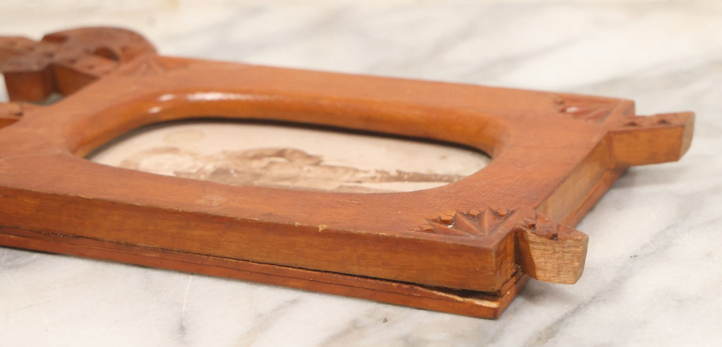 Lot 083 - Antique Folk Art Hand Carved Wooden Photo Frame With Crossed Axes, Spear Motifs, With Cabinet Card Photo Of Little Boy