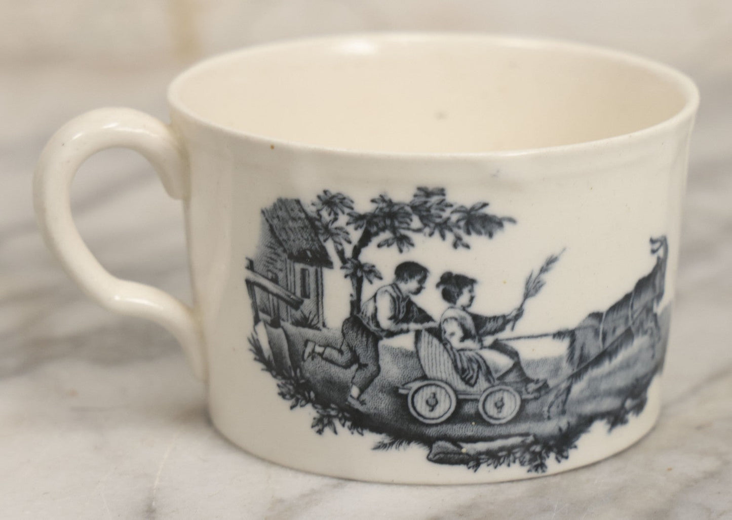 Lot 101 - Antique Transferware Children's Teacup With Scene Of Boys And Goat, Personages Line, Wedgwood, Etruria, England