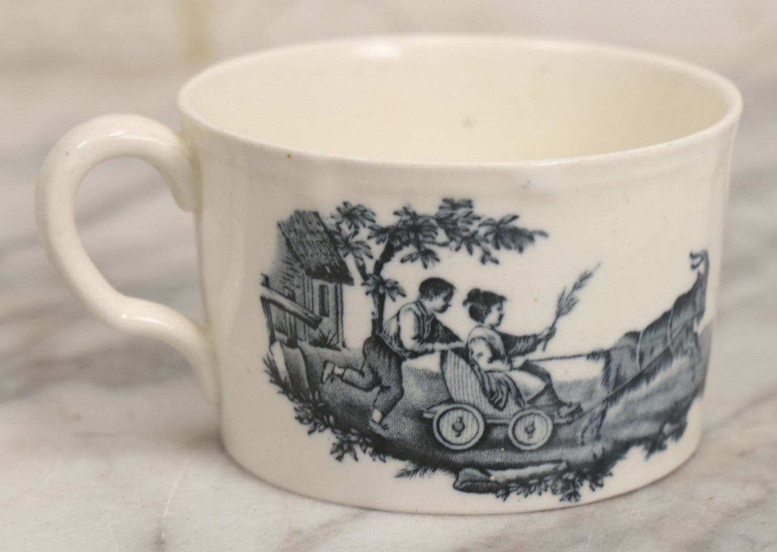 Lot 101 - Antique Transferware Children's Teacup With Scene Of Boys And Goat, Personages Line, Wedgwood, Etruria, England