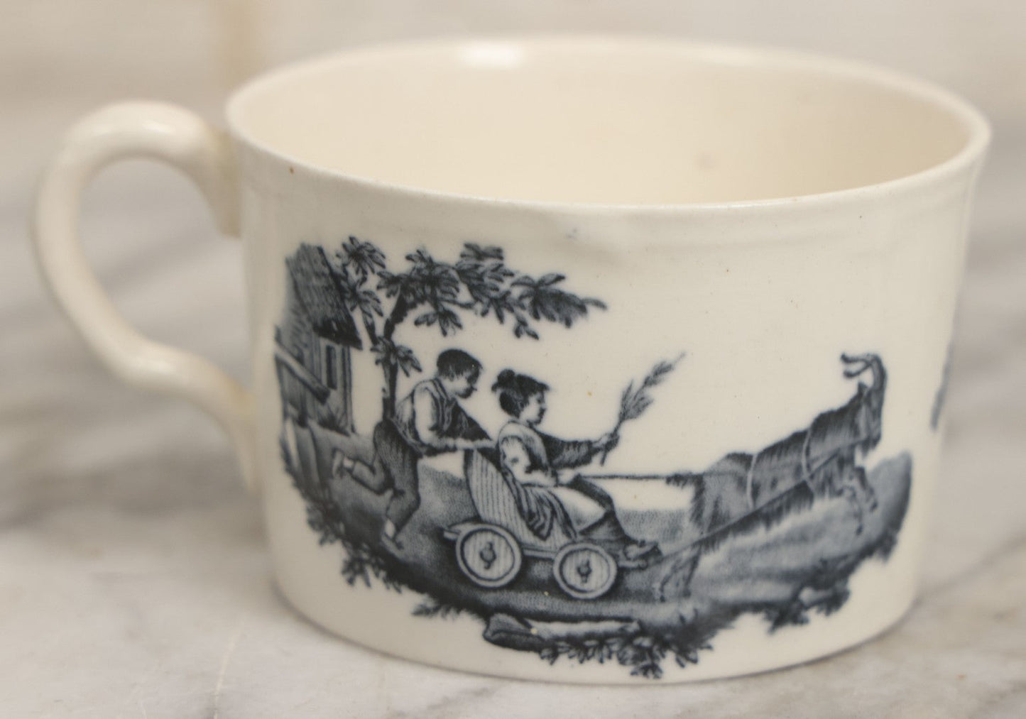 Lot 101 - Antique Transferware Children's Teacup With Scene Of Boys And Goat, Personages Line, Wedgwood, Etruria, England