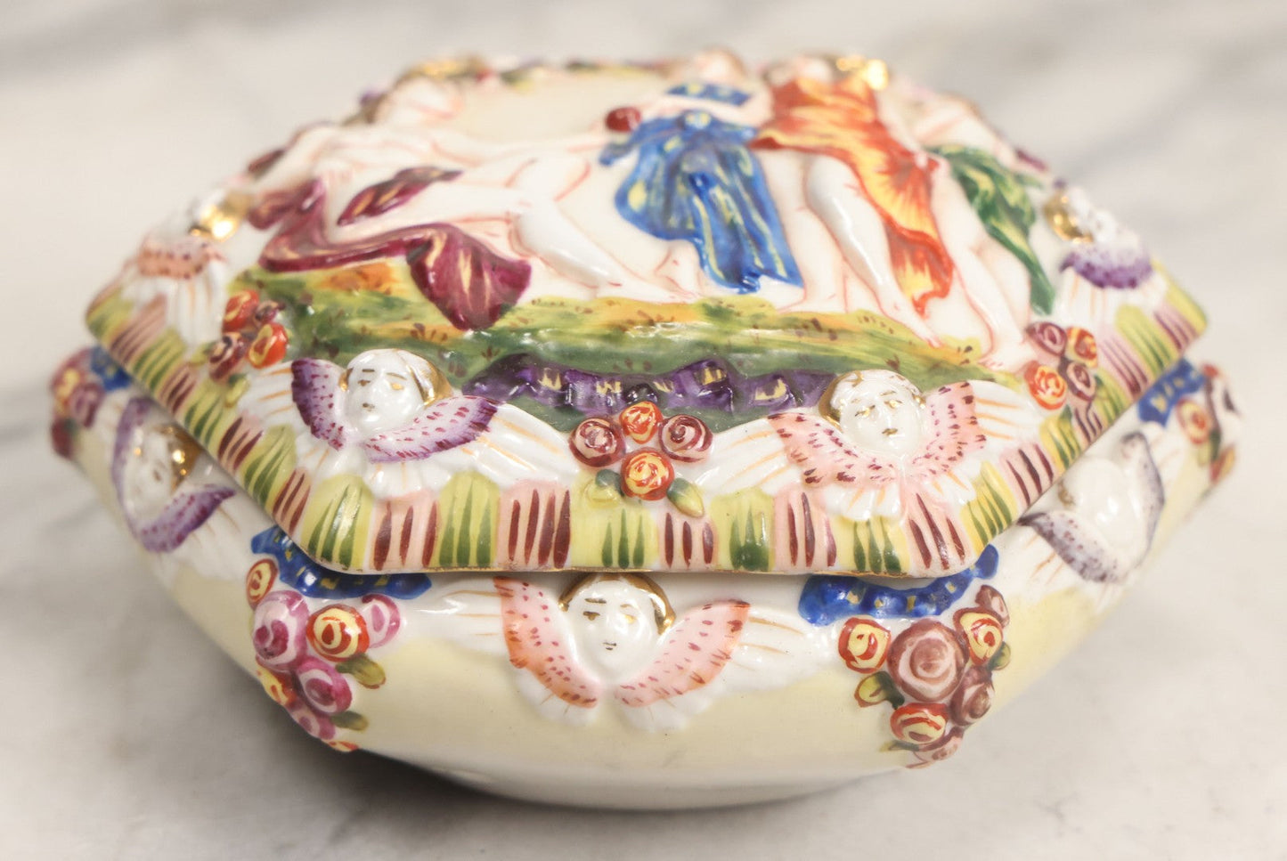 Lot 105 -  Vintage Capodimonte Style Porcelain Lidded Box With Three Graces Relief And Cherub Masks
