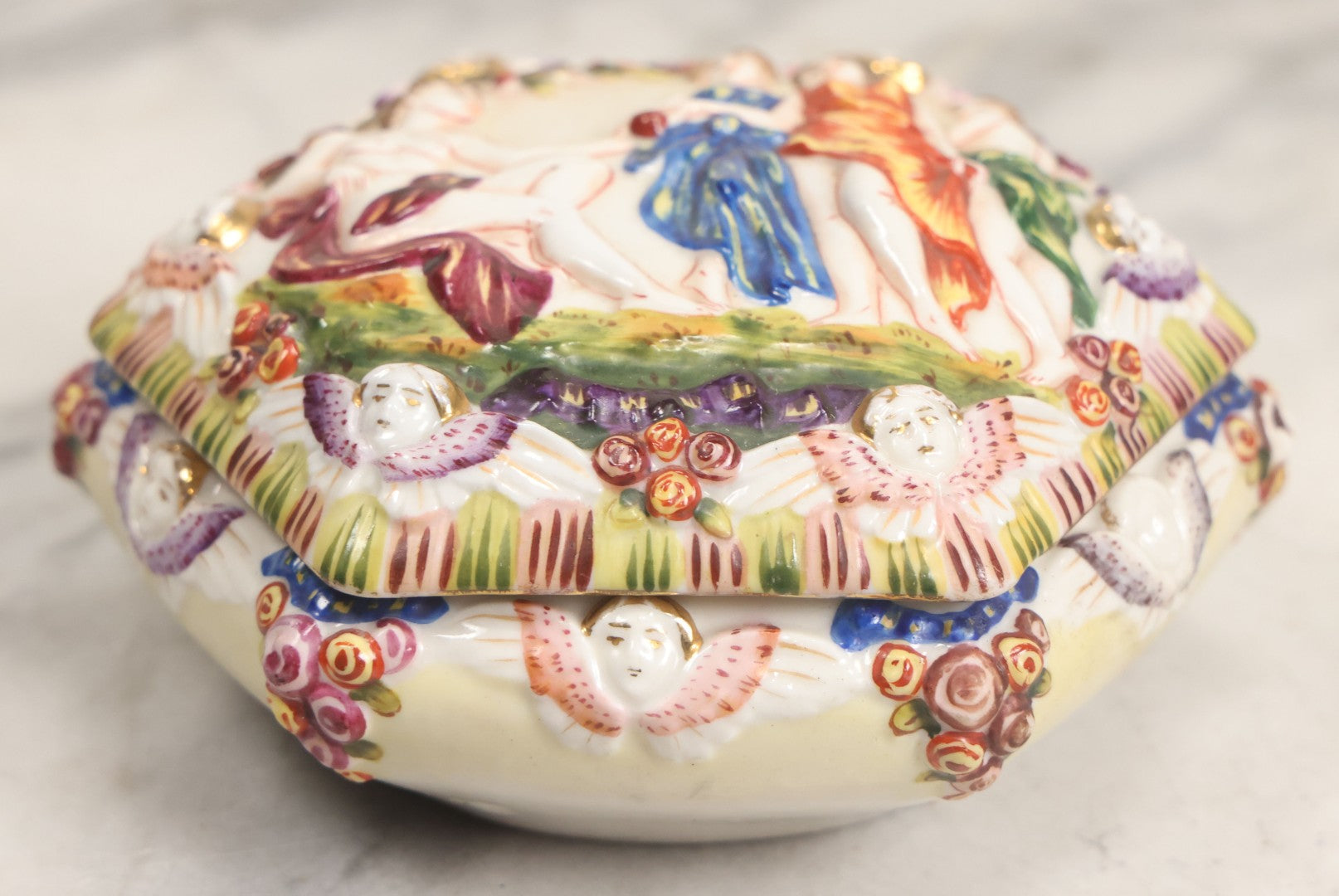 Lot 105 -  Vintage Capodimonte Style Porcelain Lidded Box With Three Graces Relief And Cherub Masks