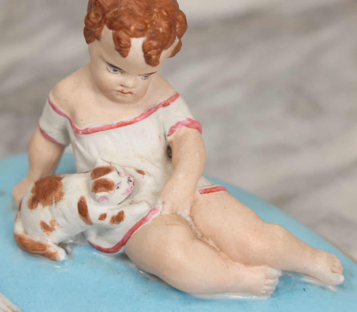 Lot 107 - Antique Porcelain Dresser Box Lid With Child And Kitten Figural Motif