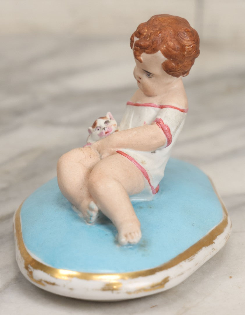 Lot 107 - Antique Porcelain Dresser Box Lid With Child And Kitten Figural Motif