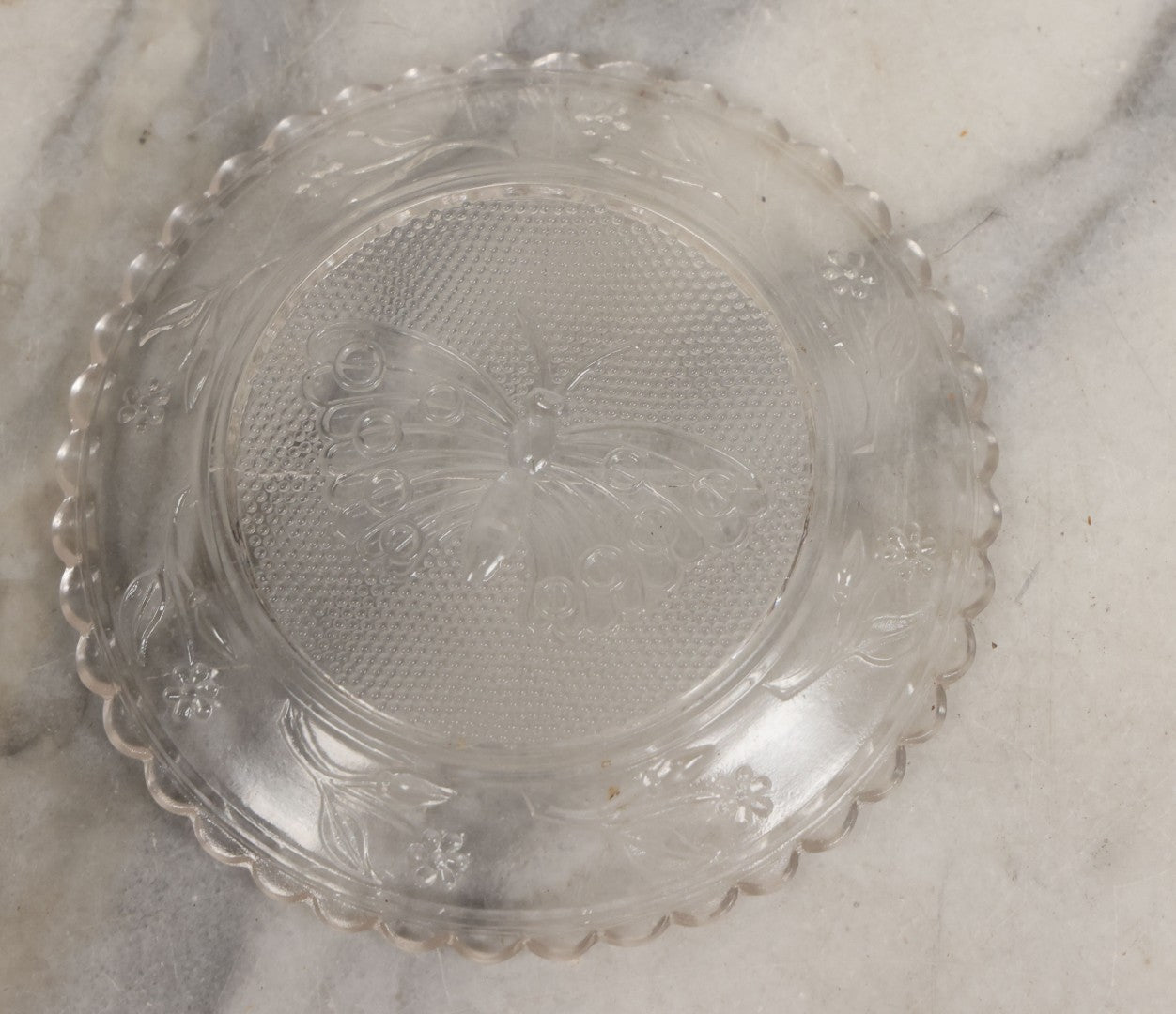 Lot 111 - Grouping Of Three Antique Pressed Glass Butterfly Cup Plate Coasters