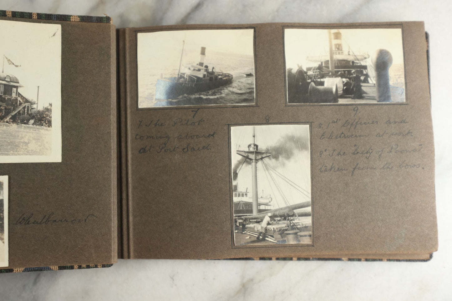 Lot 113 - Antique Snapshot Photo Album With Cloth Cover, Containing Approximately 75 Photographs With Captions, Mostly Of Travel, Including To Sea Travel, Locations In Asia, Sail Boats In Suez Canal, Singapore, Hong Kong, And More, Circa 1920s