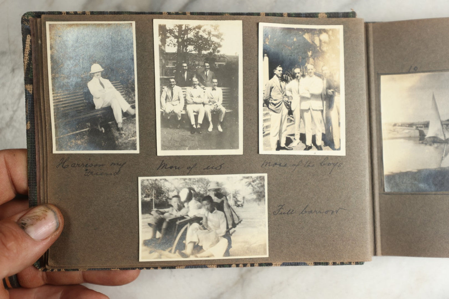Lot 113 - Antique Snapshot Photo Album With Cloth Cover, Containing Approximately 75 Photographs With Captions, Mostly Of Travel, Including To Sea Travel, Locations In Asia, Sail Boats In Suez Canal, Singapore, Hong Kong, And More, Circa 1920s